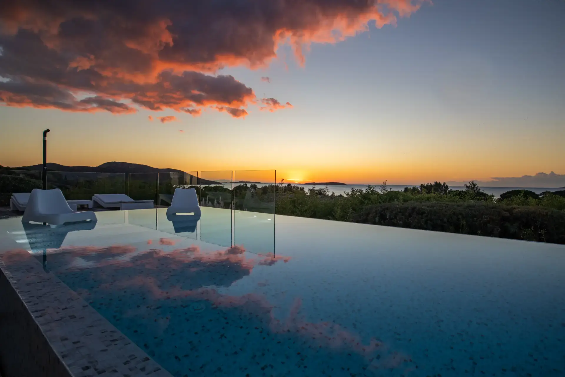 Infinity pool at sunset, Cerbicales sea view